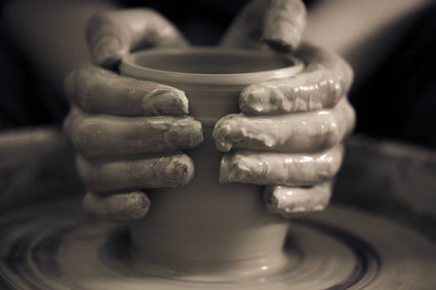Skilled artisans creating beautiful clay products and pottery
